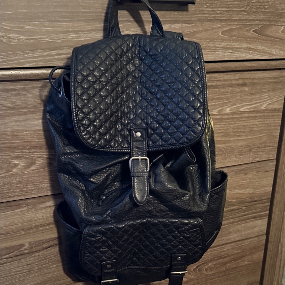 Elegant Black Quilted Backpack